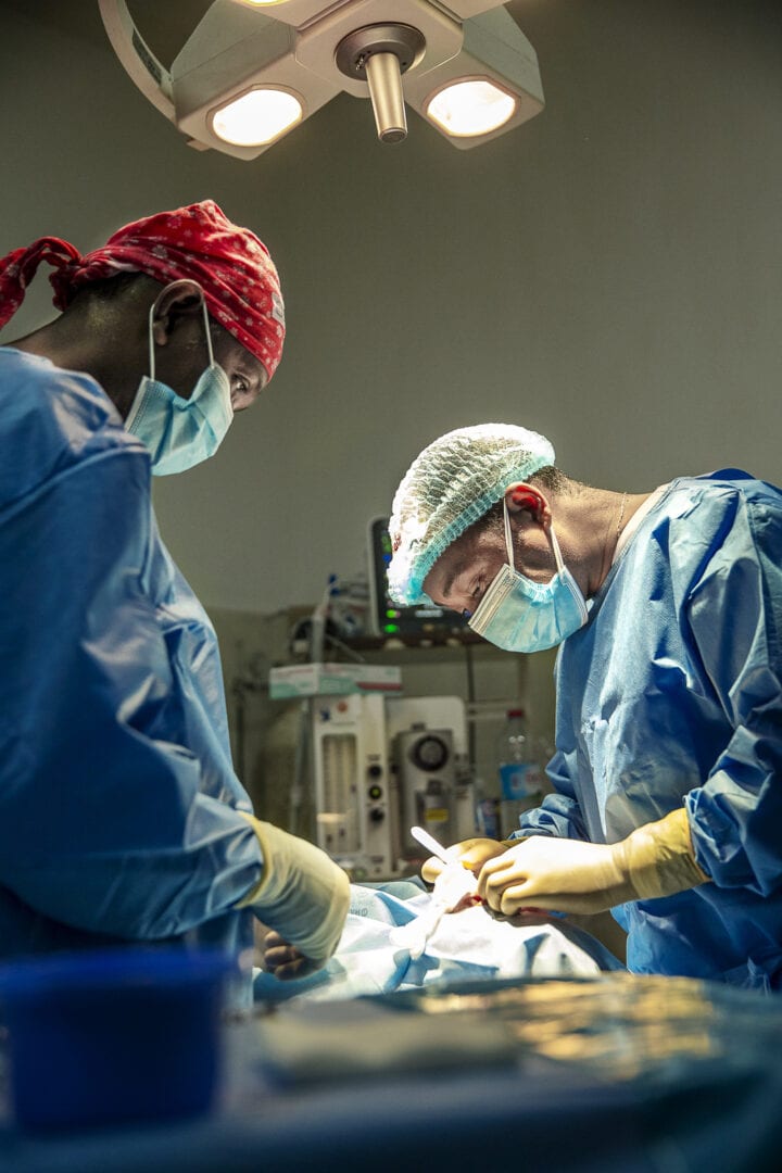 Dr. Romain Raherison and nurse Guillaume Totoriaka, operating on Honoré. Photo:  Jorgen Hildebrandt