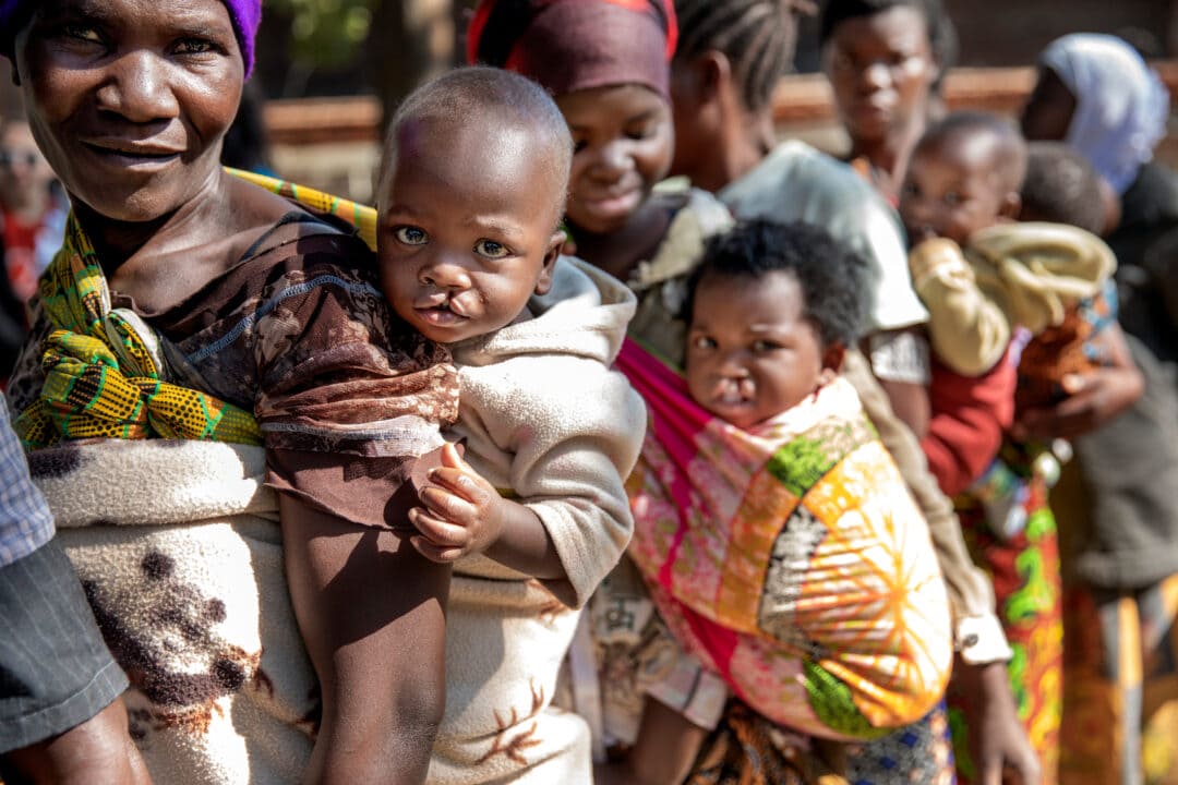 Babies with their carers during a programme in Malawi. Photo: Jasmin Shah