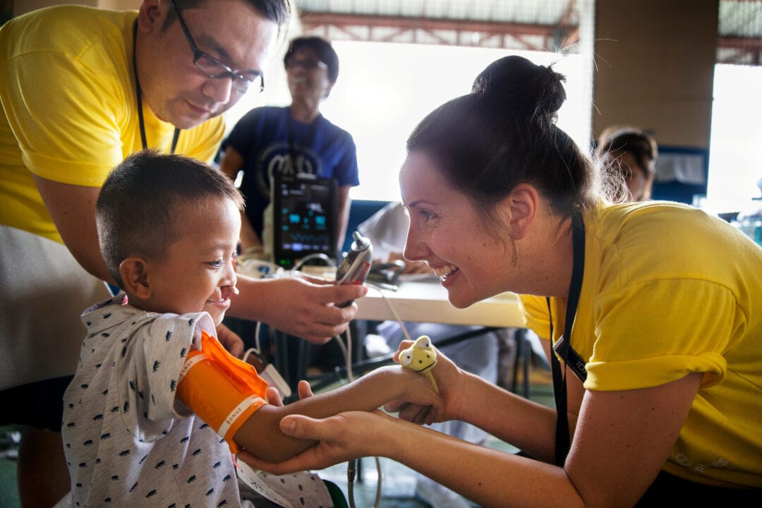 Joseph, with volunteering Nurse Ida Nilsson, during health evaluation. Photo: Jörgen Hildebrandt