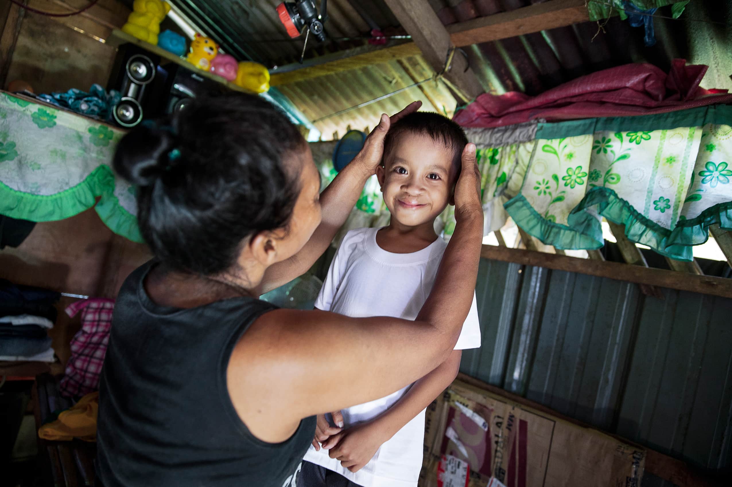 Joseph with his stepmum, after cleft surgery. Donate to Operation Smile to change more lives. Photo Jörgen Hildebrandt