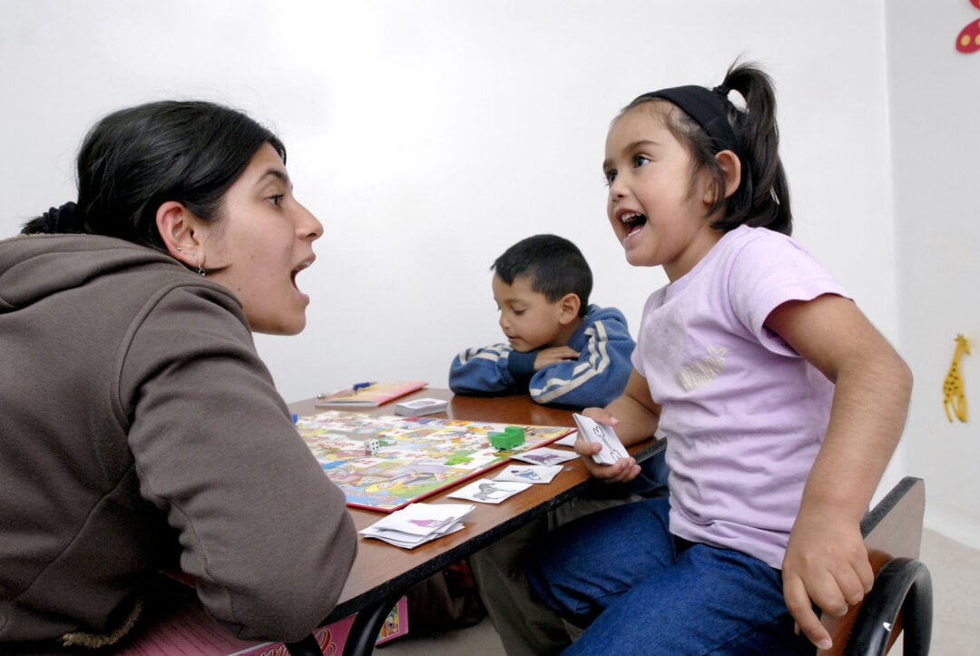 Five-years-old, Nicole works with speech therapist Diana Rodriguez.. Photo: Rohanna Mertens