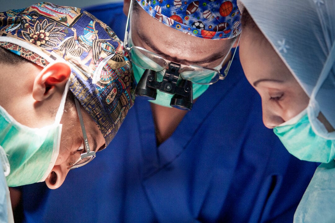 Medical volunteers in performing cleft surgery.  Photo -Jeff Zelevansky