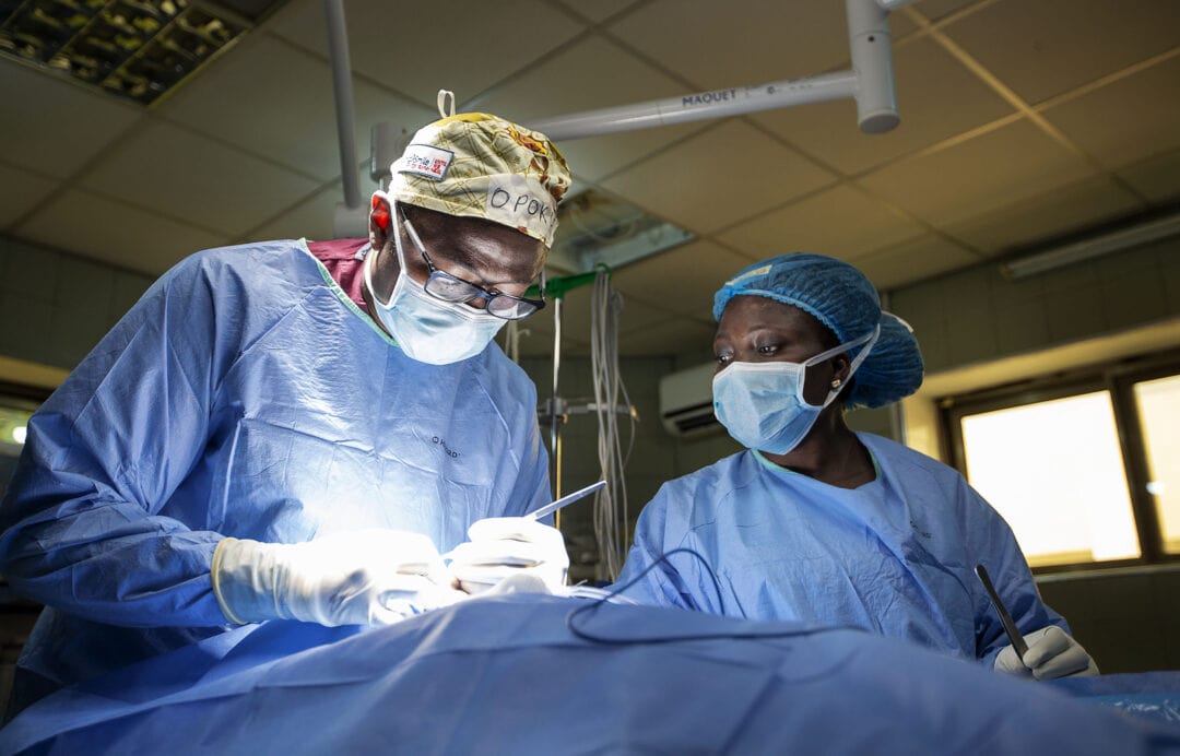 Dr Ampomah providing surgery in Ghana