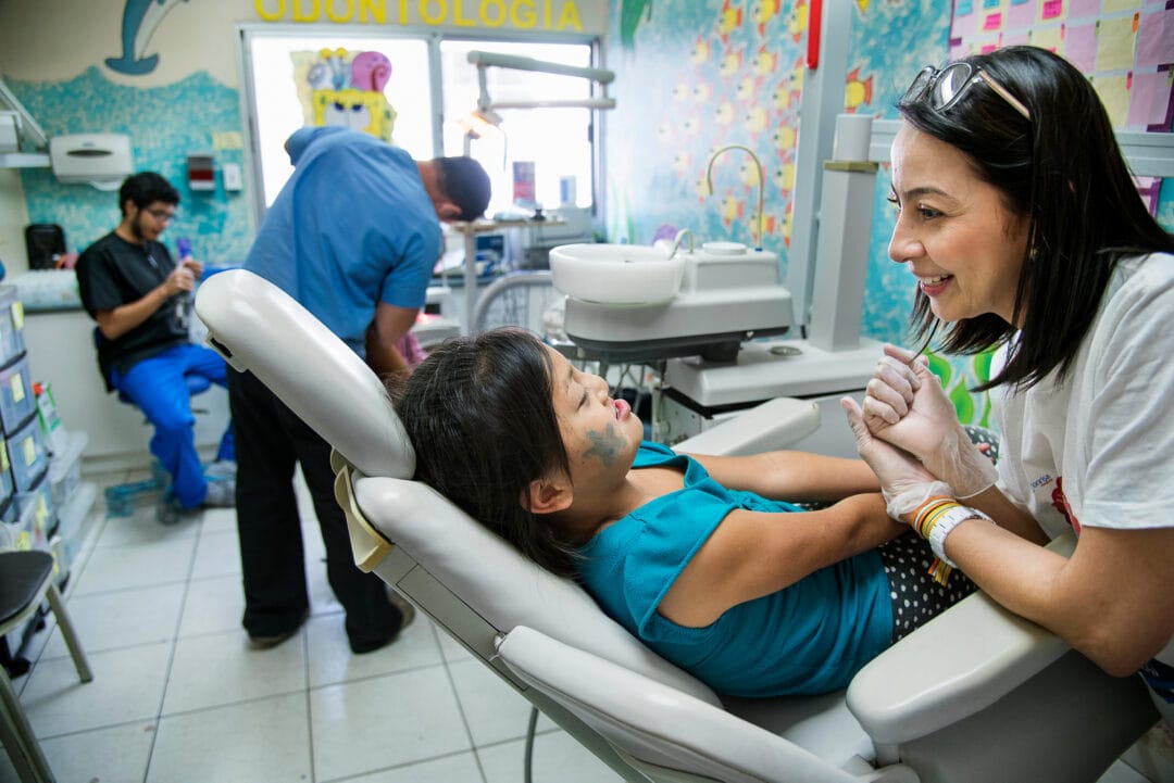 Dentist Carmi Rivera examines a child at the Operation Smile Cleft Lip and Cleft Palate Integral Care Clinic in Tegucigalpa Photo: Rohanna Mertens