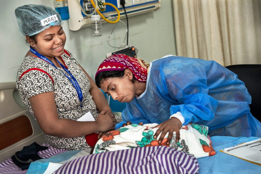 Mother sees her daughter, five-months-old Nasuma, or the first time after cleft surgery. Photo: Rohanna Mertens