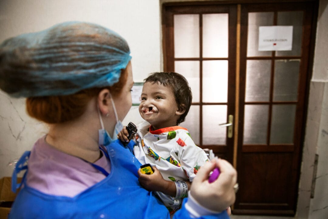 One-year-old Antsa, with Child Life Specialist, Shannon Murphy.  Photo: Jorgen Hildebrandt