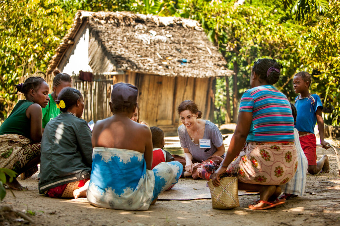 Researcher Margarita Ramos and Kristen Hatcher conducting a focus group during the 'Barriers to Care' study in a village north of Tamatave. Operations Smile's 2014 mission to Tamatave Madagascar. Photo: Zute Lightfoot