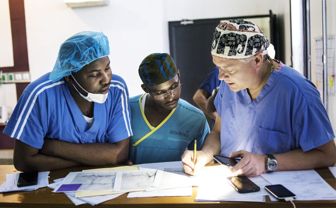 Cleft Surgeon Steve Naumv teaching to local surgery residents during the surgical rotation in Rwanda