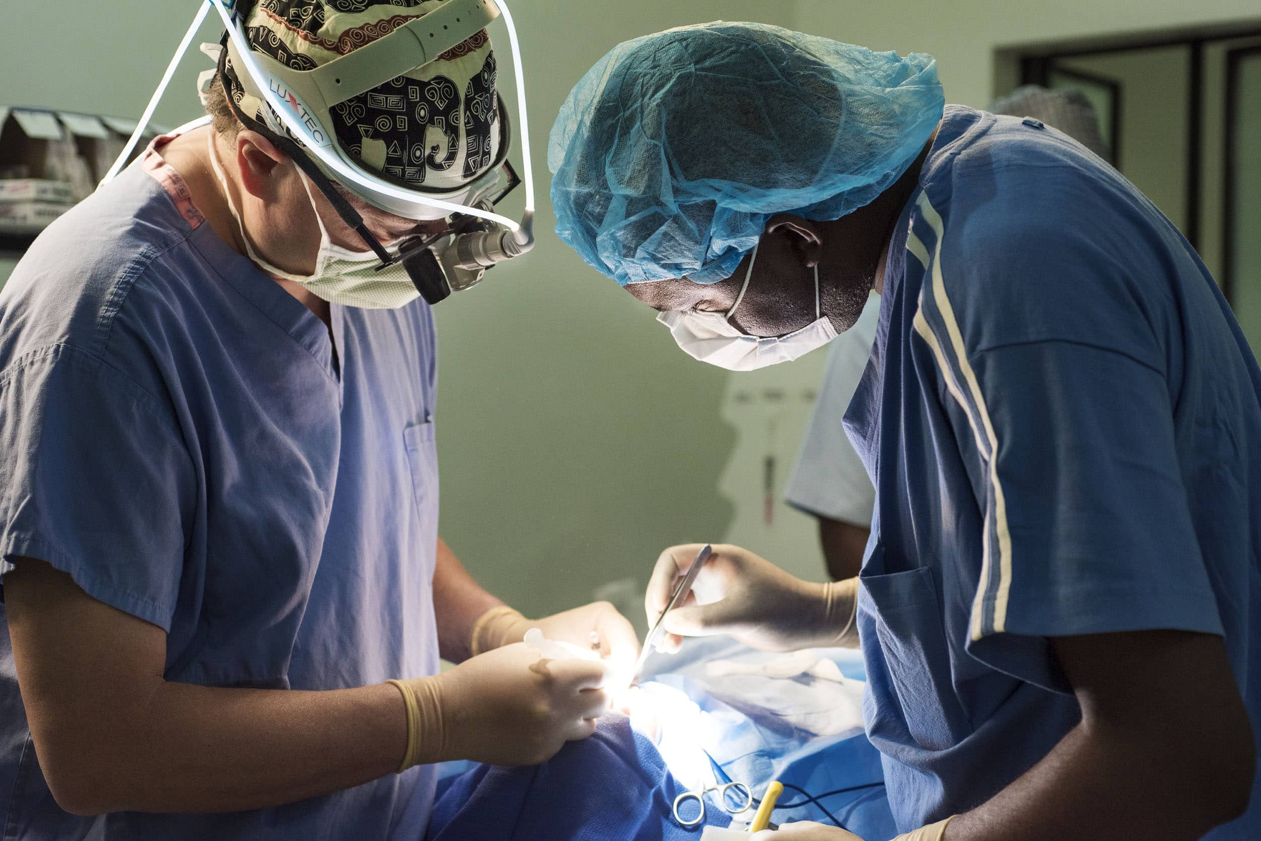 Cleft Surgeon Steve Naumv teaching to local surgery residents during the surgical rotation in Rwanda