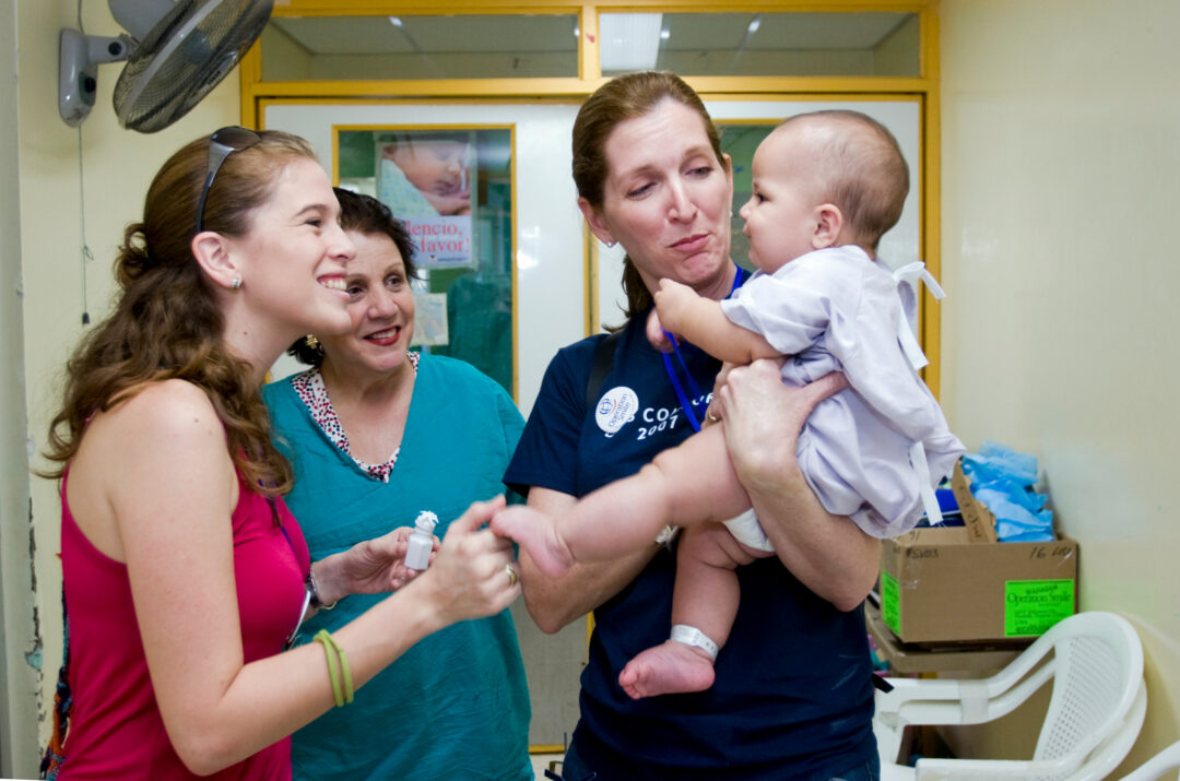 Operation Smile Nicaragua co-founder, Grace Gonzalez, with patient, in 2007. Photo: Vasna Wilson