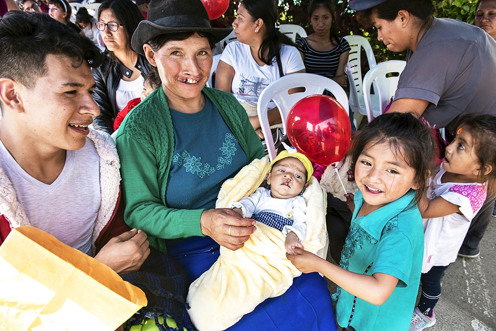 Andrea holds her two-month-old son, Kyungmin, during Operation Smile Peru's 2019 medical programme in Lima, Peru. Photo: Margherita Mirabella.